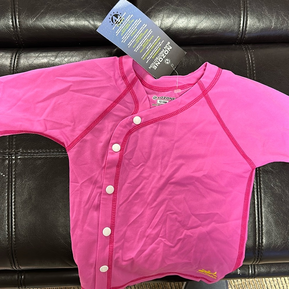 Pink long sleeve swim top by Nozone. 12-18 months.